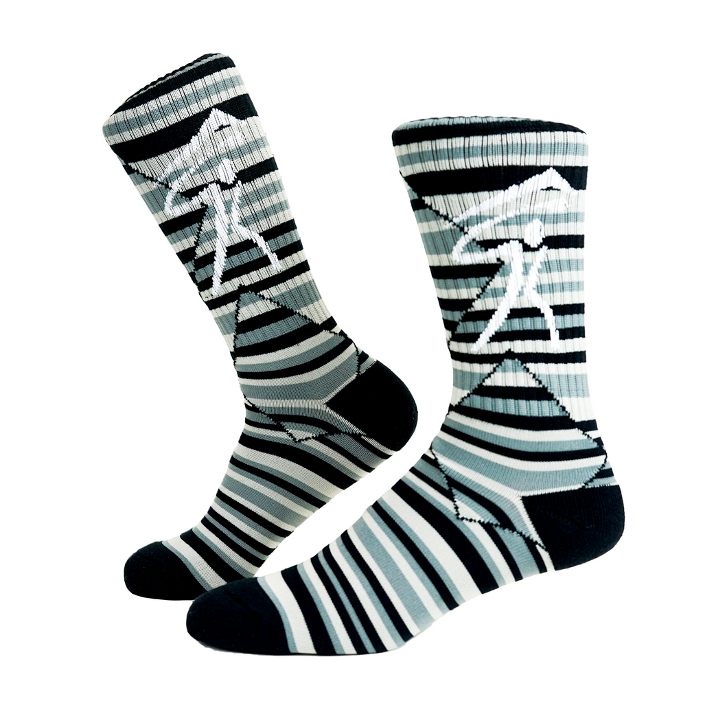 A pair of custom striped socks with a design on the ribbing of a man golfing
