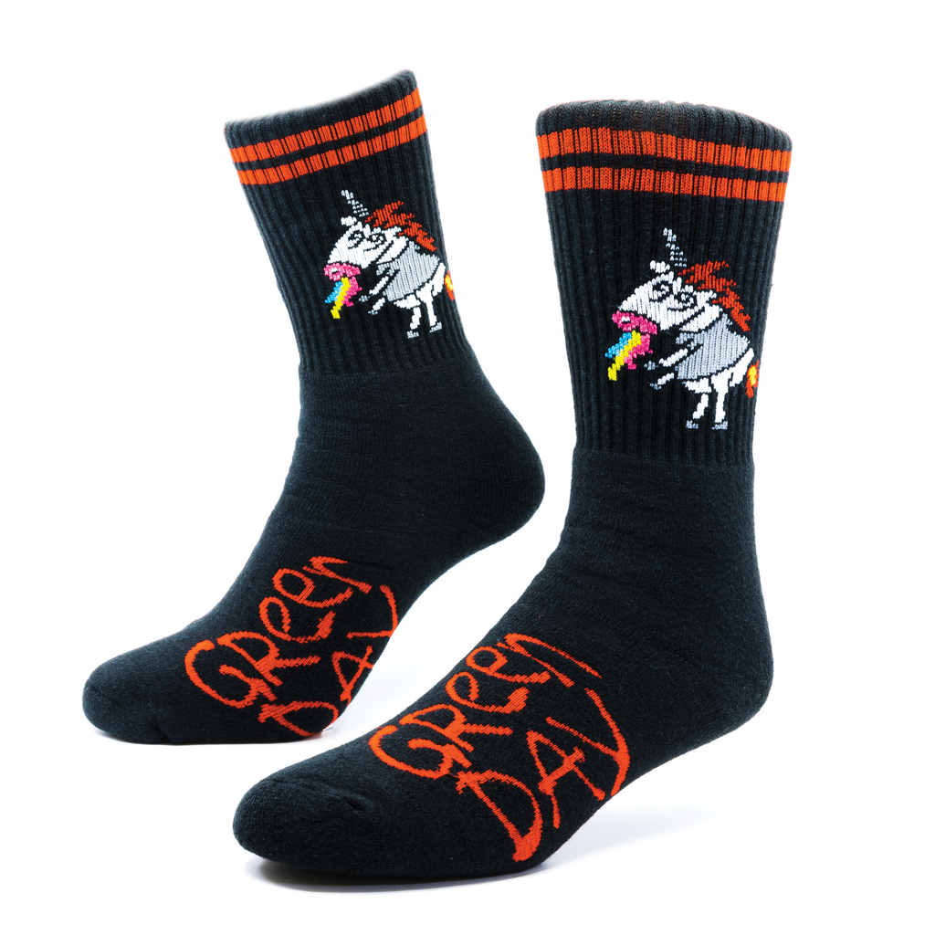 A pair of of custom-knitting black socks with red stripes and a unicorn knitting into the ribbing