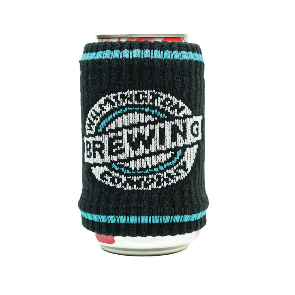 A can covered with a knitted drink sleeve that depicts the logo for Wilmington Brewing Company